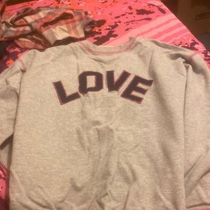 Gray sweater. Says love long sleeve